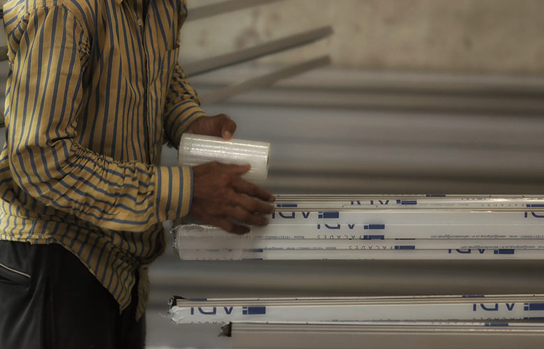 Modern packaging and packing department for finished coated aluminium profiles ready for dispatch at Radiant Anodisers